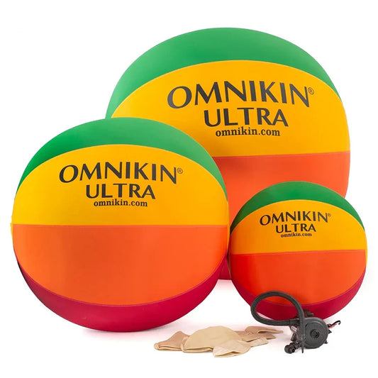 Three various size, multicolored Omnikin Ultra balls with extra bladders and an inflator. 
